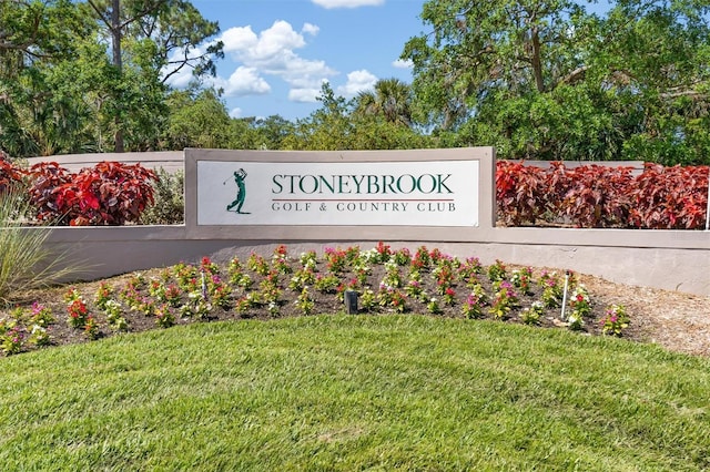 4063 Westbourne Cir, Sarasota, FL 34238 - community / neighborhood sign featuring a lawn