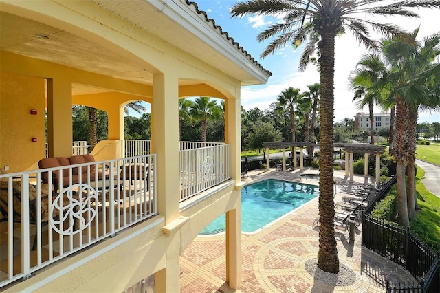 6465 Watercrest Way Unit 404, Lakewood Ranch, FL 34202 - community pool with a pergola and a patio area