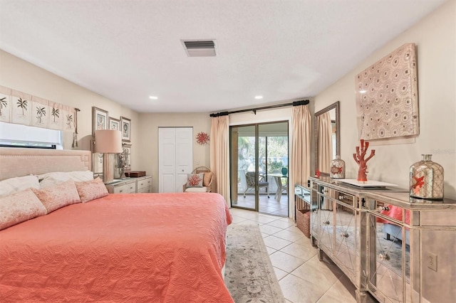 bedroom featuring access to outside, light tile patterned floors, and recessed lighting