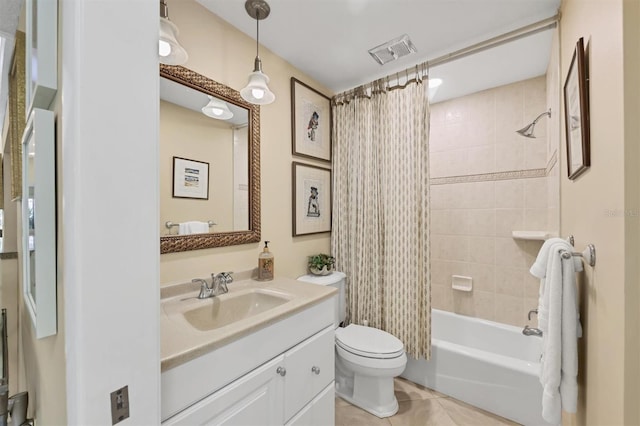 bathroom with tile patterned floors, toilet, vanity, and shower / bath combination with curtain