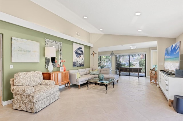 living room with lofted ceiling, recessed lighting, and light tile patterned floors