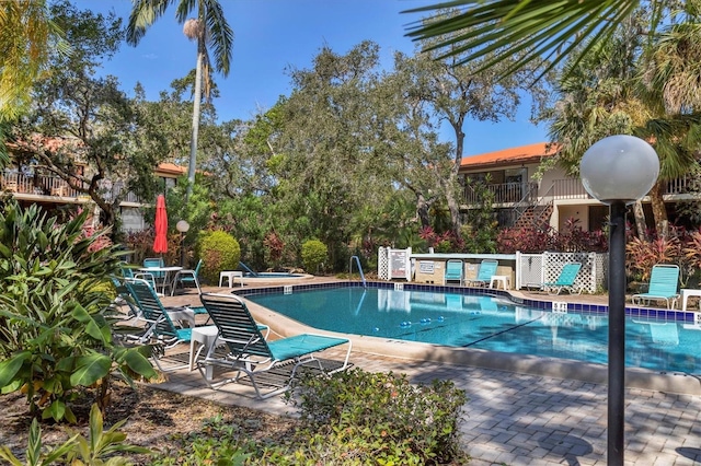community pool featuring a patio area