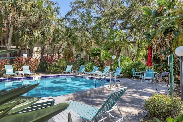 community pool with a patio