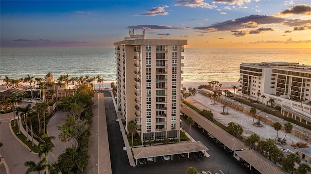 1212 Benjamin Franklin Dr Unit 909, Sarasota, FL 34236 - view of building exterior with a water view