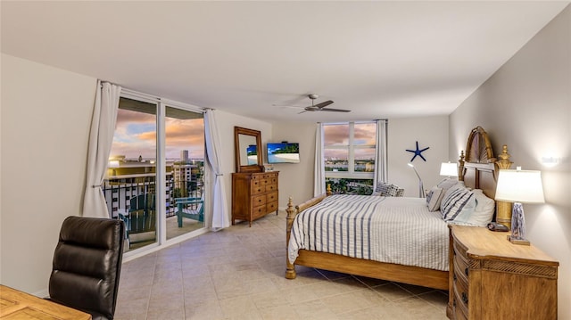 1212 Benjamin Franklin Dr Unit 909, Sarasota, FL 34236 - bedroom with access to exterior, a wall of windows, light tile patterned flooring, and ceiling fan