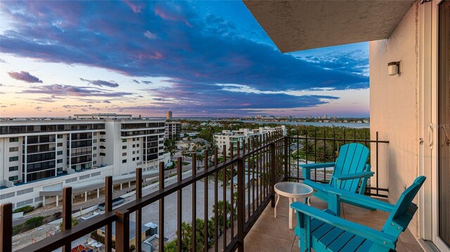 1212 Benjamin Franklin Dr Unit 909, Sarasota, FL 34236 - balcony at dusk with a view of city