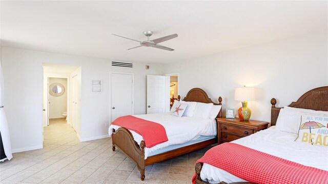 1212 Benjamin Franklin Dr Unit 909, Sarasota, FL 34236 - bedroom featuring baseboards and ceiling fan