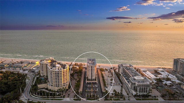 1212 Benjamin Franklin Dr Unit 909, Sarasota, FL 34236 - aerial view at dusk of a water view and a view of city