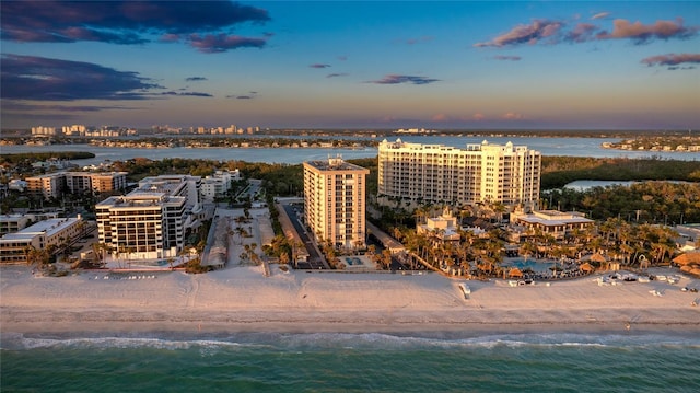 1212 Benjamin Franklin Dr Unit 909, Sarasota, FL 34236 - aerial view at dusk of view of water and beach and a city view