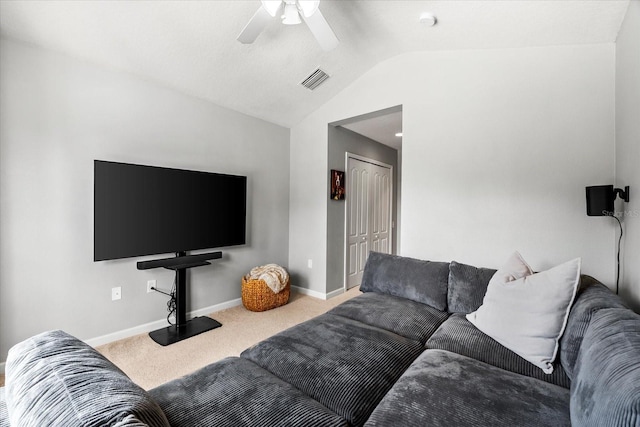 living area featuring lofted ceiling, carpet, baseboards, and ceiling fan