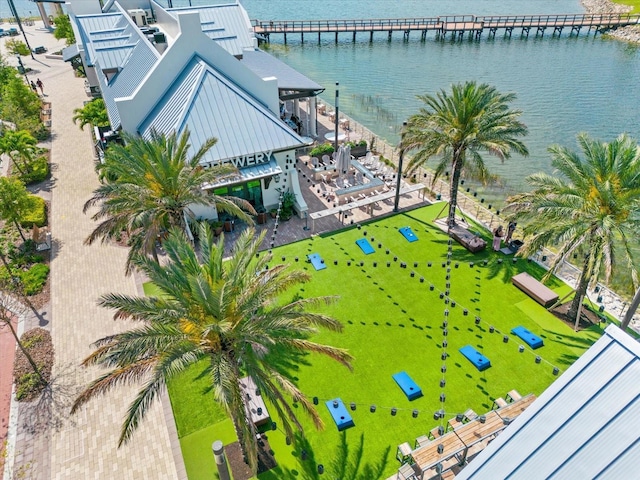 aerial view of property and surrounding area featuring a nearby body of water