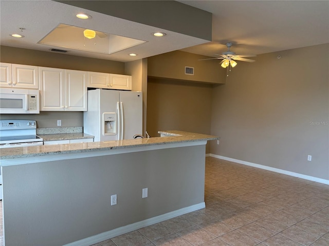 kitchen with white cabinetry, visible vents, baseboards, ceiling fan, and white appliances