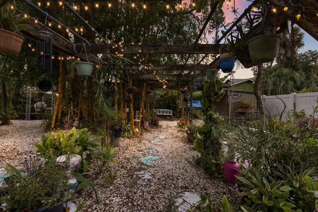 2207 Hickory Ave, Sarasota, FL 34234 - view of yard featuring a pergola