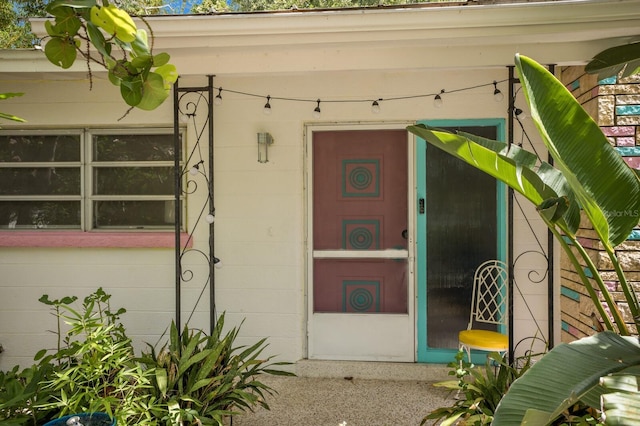 2207 Hickory Ave, Sarasota, FL 34234 - doorway to property featuring concrete block siding