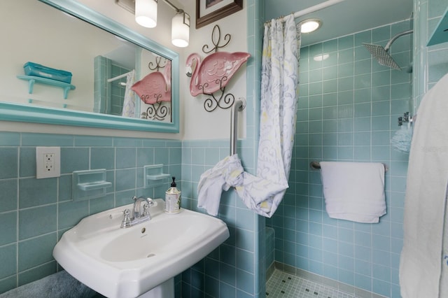 2207 Hickory Ave, Sarasota, FL 34234 - full bathroom with tiled shower, tile walls, and a sink