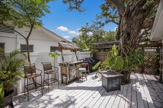 2207 Hickory Ave, Sarasota, FL 34234 - wooden deck with area for grilling
