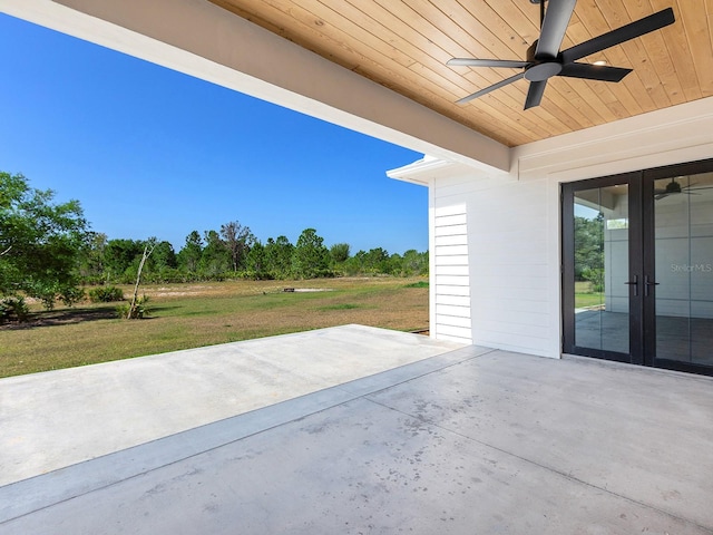 view of patio featuring ceiling fan and french doors