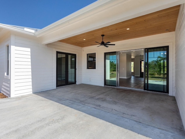 view of patio featuring a ceiling fan