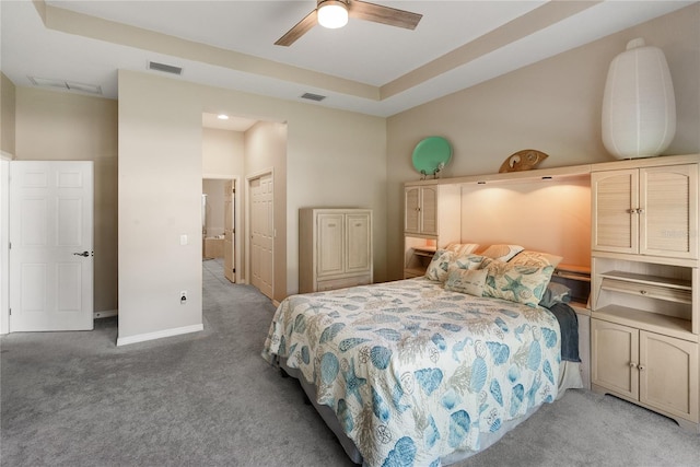 bedroom featuring light carpet, baseboards, and a ceiling fan