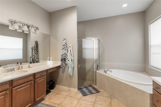 full bath featuring vanity, tile patterned flooring, a bath, a shower stall, and recessed lighting