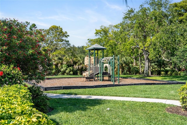communal playground featuring a yard