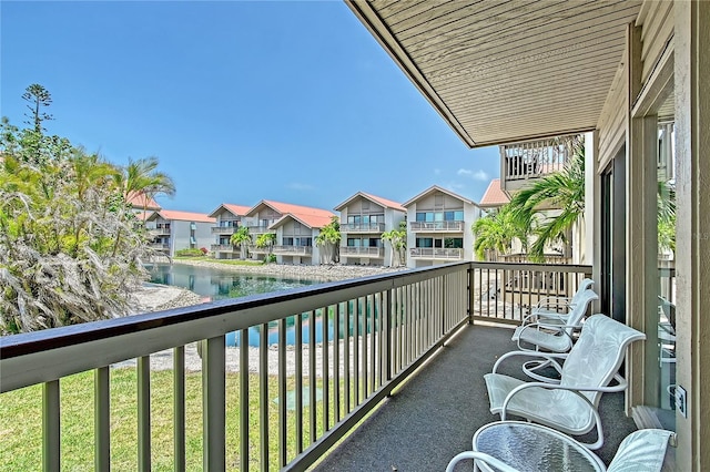 1159 Lake House Cir Unit C120, Sarasota, FL 34242 - balcony featuring a water view and a residential view