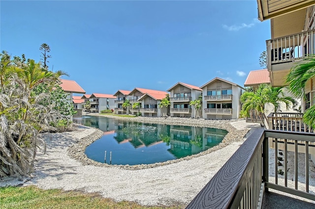 1159 Lake House Cir Unit C120, Sarasota, FL 34242 - view of swimming pool featuring a water view and a residential view