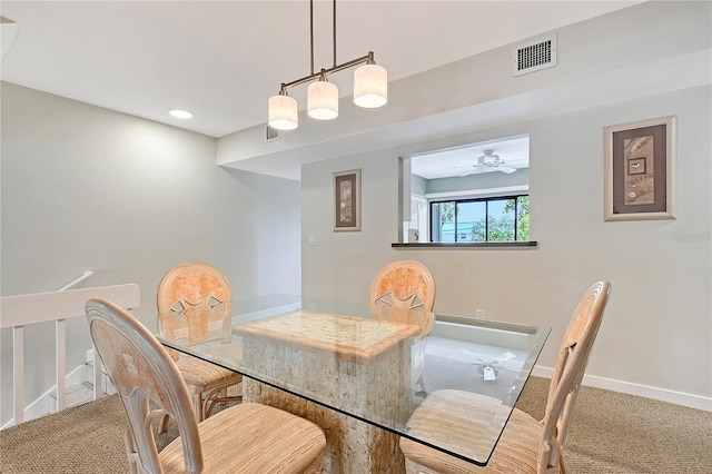 1159 Lake House Cir Unit C120, Sarasota, FL 34242 - dining area with carpet flooring, baseboards, and a ceiling fan