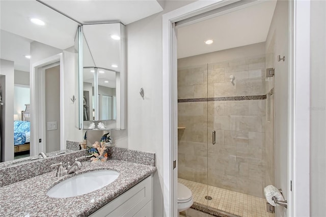 1159 Lake House Cir Unit C120, Sarasota, FL 34242 - bathroom with a shower stall, ensuite bathroom, recessed lighting, vanity, and toilet