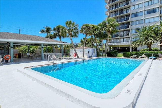 1159 Lake House Cir Unit C120, Sarasota, FL 34242 - community pool featuring fence and a patio