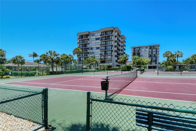 1159 Lake House Cir Unit C120, Sarasota, FL 34242 - view of tennis court with fence and community basketball court