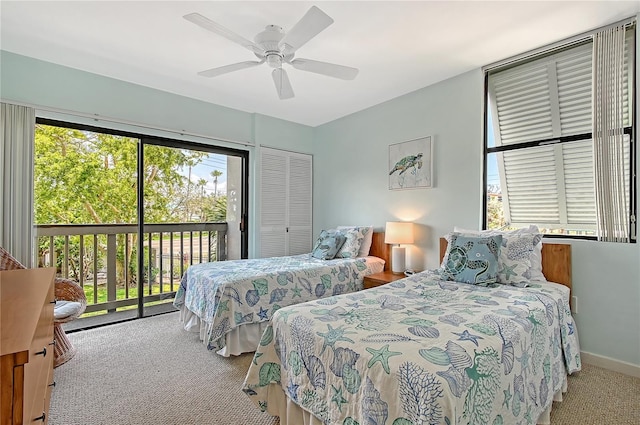 1159 Lake House Cir Unit C120, Sarasota, FL 34242 - bedroom with carpet floors, access to exterior, and a ceiling fan