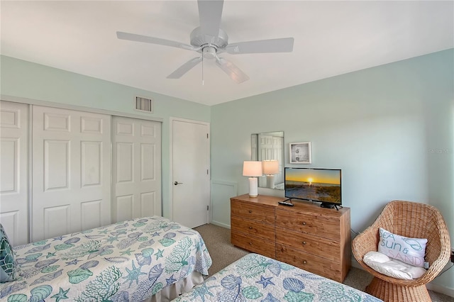 1159 Lake House Cir Unit C120, Sarasota, FL 34242 - carpeted bedroom with a closet, a ceiling fan, and baseboards