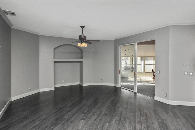 interior space with crown molding, a ceiling fan, visible vents, and wood finished floors