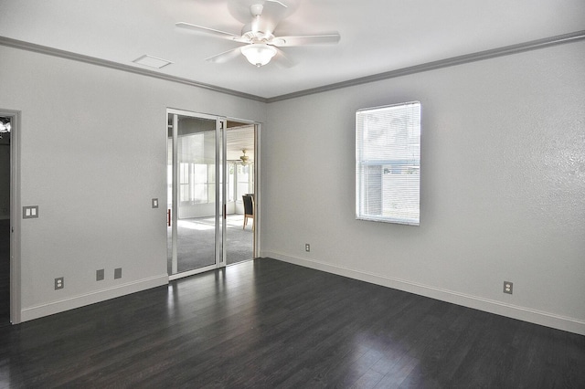 unfurnished room featuring a ceiling fan, a wealth of natural light, crown molding, and dark wood-style flooring