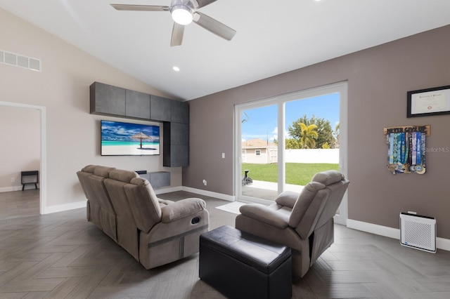 living area featuring baseboards, ceiling fan, lofted ceiling, and recessed lighting