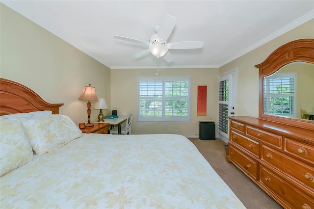 bedroom featuring light colored carpet, multiple windows, crown molding, and a ceiling fan