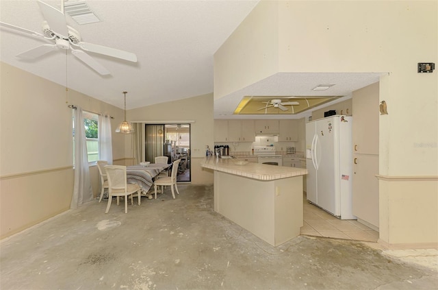 kitchen with white appliances, ceiling fan, a peninsula, light countertops, and lofted ceiling