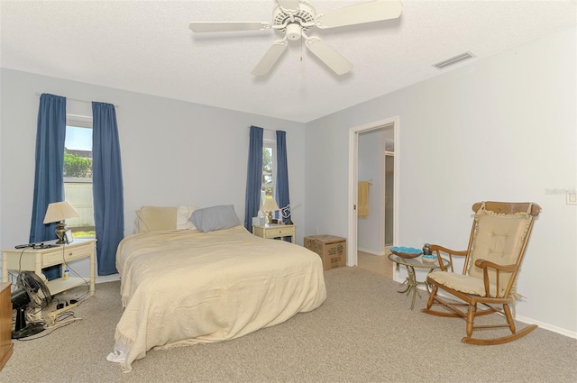 bedroom featuring carpet flooring, baseboards, and ceiling fan