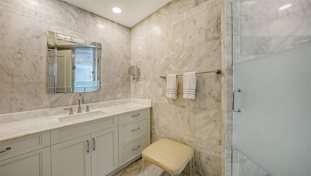 1241 Gulf Of Mexico Dr Unit 803, Longboat Key, FL 34228 - full bath featuring tile walls, vanity, a stall shower, and toilet