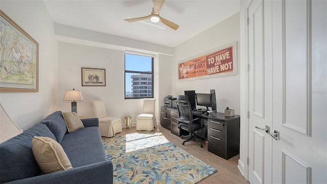 1241 Gulf Of Mexico Dr Unit 803, Longboat Key, FL 34228 - home office with ceiling fan and light wood finished floors
