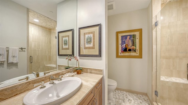 1241 Gulf Of Mexico Dr Unit 803, Longboat Key, FL 34228 - bathroom with a stall shower, toilet, vanity, and baseboards