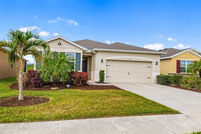 single story home with a garage, driveway, a front yard, and stucco siding