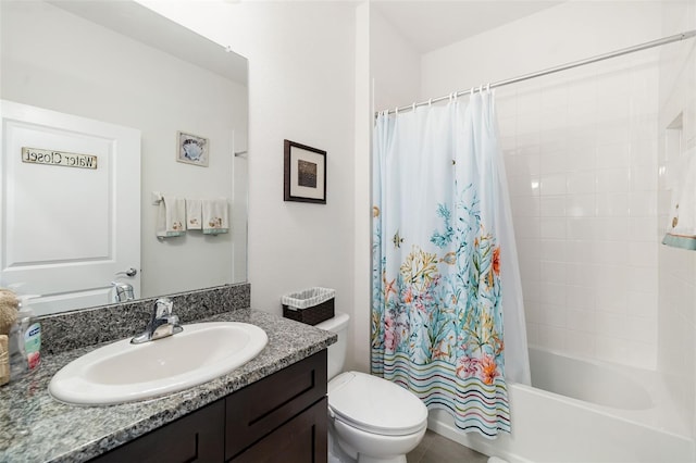bathroom with toilet, shower / tub combo with curtain, and vanity