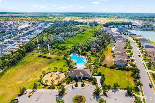 aerial view of residential area with a pool area