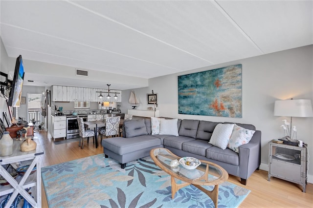 living room featuring light wood-type flooring