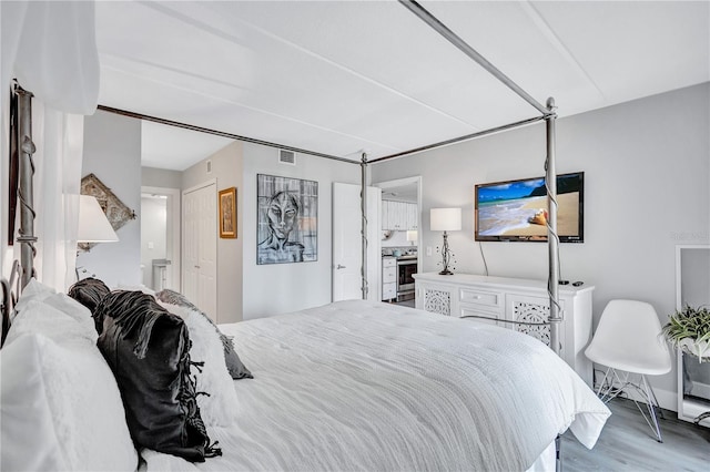 bedroom featuring wood finished floors