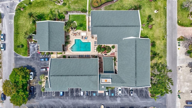 view of property location with a pool area