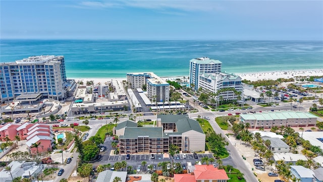 drone / aerial view of waterfront with a beach