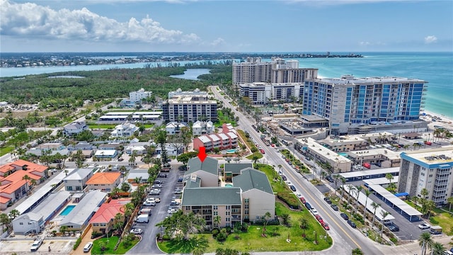view of urban area with a large body of water